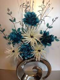 We did not find results for: Artificial Silk Flower Arrangement Teal Cream Flowers Modern Metallic Va Artificial Silk Flower Arrangements Silk Flower Arrangements Flower Arrangements Diy
