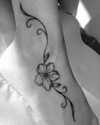 Simple but beautiful cherry blossom tattoo on the shoulder. 26 Sophisticated Cherry Blossom Tattoo Designs