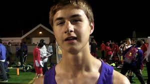 Brandon Lockerby of Downers Grove North HS runs under 5 minutes for the  1600m for the first time