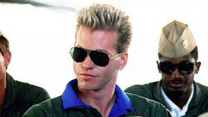 While attending the navy's elite air combat training academy, affectionately known as top gun, maverick romances the civilian astrophysics instructor (kelly mcgillis) and competes with crackerjack pilot ice (val kilmer) for top honors. Val Kilmer Offered Top Gun 2 Role Variety