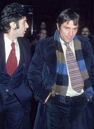 Robert de niro is behind some of america's biggest filmscredit: Robert De Niro And Al Pacino At The Premiere Of Godfather Ii In 1974 9gag