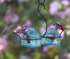 Watching little hummingbirds enjoy a meal is a beautiful moment to capture. Duncraft Com Bouquet Classic 2 Botanica Hummingbird Feeder