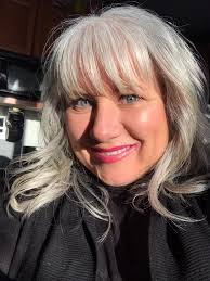 I am 74, natural brunette only a few Grey's and unruly short curls. What is  the best cut for curly hair? Suggestions please?