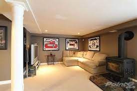 A stove like this can tap into your existing gas supply, and besides offering heat, there's another advantage. Pin By Tracy Boston On New Home Someday Basement Woodstove Finishing Basement Basement Remodeling