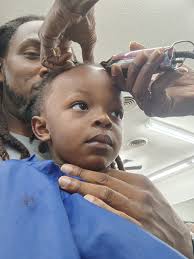 During Ky'B's first barber shop visit, which I had the pleasure of  attending, I was overcome with emotion. I didn't feel sadness or upset,  merely a profound emotional resonance. It had not