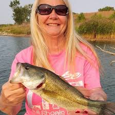 Man changes tire at gas station in Yuma