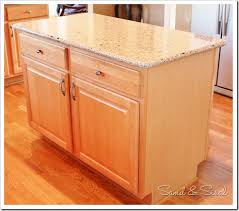 Kitchen islands make it easy to organize kitchen materials, prep meals and provide additional seating, all at once. Kitchen Island Makeover Sand And Sisal