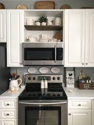 Just purchased new stove and microwave to put above stove, however we do not have a cabinet above the stove to attach it too.any suggestions what we can do.desperate.thanks. New Microwave Shelf Cabinet Kitchen Renovation Kitchen Remodel Home Kitchens