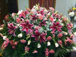 Pink Snaps Pale Pink Roses Dark Pink Lilies Pink Carnations Pink Alstroemeria And Baby S Breath Memorial Flowers Funeral Floral Funeral Flowers
