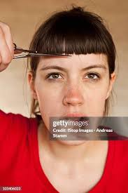 403.334 Bangs Haircut Stock Photos, High-Res Pictures, and Images