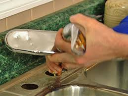 Use an allen wrench to loosen the setscrew on the faucet handle, then remove the handle. How To Remove And Replace A Kitchen Faucet How Tos Diy