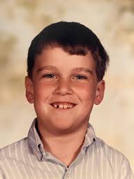 Can a scribbled face be removed from a 1986 class picture?