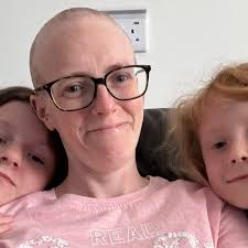 Mother who thought bloating was sign of pregnancy diagnosed with rare  ovarian cancer