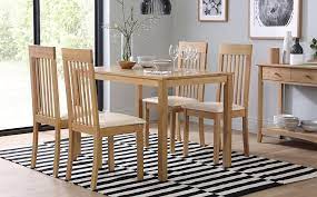 Get dining chairs and tables, sideboards and bar stools for sale at low prices here. Milton Oak Dining Table With 4 Oxford Ivory Chairs Only 249 99 Furniture Choice Mobler Matrum Modernt Stolar