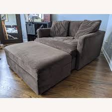 This chair and a half is just right for snuggling up with a loved one in front of a movie or with the little ones for storytime. Crate Barrel Lounge Chair A Half Plus Ottoman Aptdeco