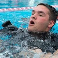 Seaman Robert Reynolds, a search and rescue swimmer
