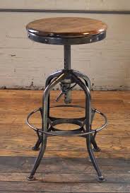 Base measures 14 1/2 x 14 1/2. Vintage Industrial Wood And Steel Counter Island Adjustable Bar Stool For Sale At 1stdibs