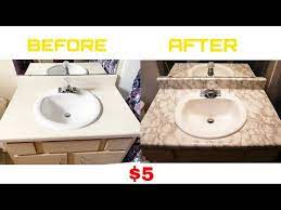 This model uses (3) 60 watt medium base incandescent bulb (a19 bulb type). Transforming Bathroom Sink Diy With Marble Contact Paper Youtube