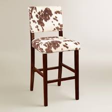 Wayfair.com has been visited by 1m+ users in the past month Brown Faux Cowhide Addison Upholstered Barstool By World Market In 2021 Cow Print Chair Bar Stools Upholstered Barstools