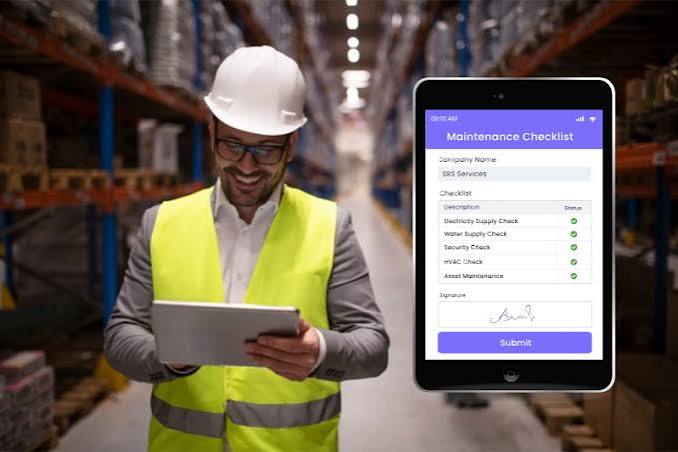 Technical field service technician completing digital checklist on tablet
