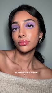 A little 70s inspired purple eye makeup look. @Violette Liquid eyeshadow  Nuage de Lilas & Violette Sauvage @Glossier Creamy Long-Wearing Eyeliner  Muse @Maybelline New York The Falsies Surreal ...