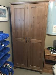 22 inches hanging rail and large shelf and two drawers at bottom. Ikea Diktad Wardrobe