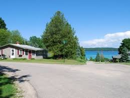 The three lager family style cabins sit lakeside offering a view of the lake from both inside and out. Torch Lake Rentals Vacation Rentals Long Term Rentals