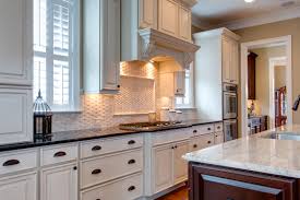 Installing a subway tile backsplash into your kitchen provides both an updated look (that will tip: White Kitchen With Basketweave Tile Backsplash Celebrate Decorate