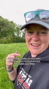 Cleaning up the mess of a fallen oak tree and fixing our goat fence