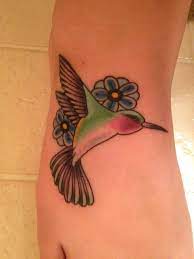 My New Beautiful Hummingbird Tattoo Done By Micah At Red Handed Tattoo The Meaning Of My Tattoo Is For My Grandmas Mem Tattoos Hand Tattoos Hummingbird Tattoo