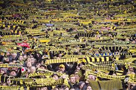 Famous for the intense atmosphere it breeds, the south terrace has been nicknamed die gelbe wand, meaning the yellow wall. Borussia Dortmund Have A Not So Secret Weapon In Their Europa League Showdown With Tottenham A Yellow Wall Of 20 000 Fans Who Create The Deafening Noise Of 150 000 Daily Mail Online