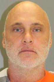 Police: Hatchet-wielding man picked up