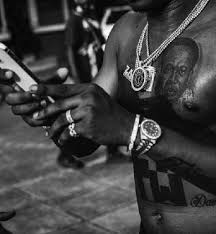The latest zlatan ibrahimovic tattoo on the stomach is a tattoo made in white ink. Nigerian Musician Zlatan Shows His Tattoo Of Ghana S Kwame Nkrumah Starblogg Ccom