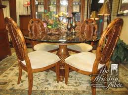 It is one of the cindy crawford microfiber ones in a nice grey color. Cindy Crawford Glass Top Table On A Pedestal Base With Four Chairs The Chairs Have A Palm Leaf Back Subtle Tropic Dining Table Makeover Glass Top Table Table