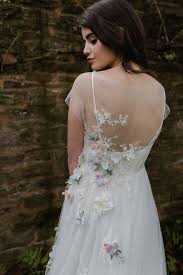 Floral Wedding Dresses Beauteous Bridal Details And Flower Filled Table Decor Lo Floral Wedding Dress Wedding Dresses With Flowers Beautiful Wedding Dresses
