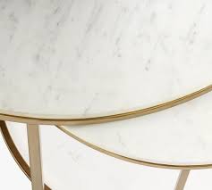 Fool everyone with this faux marble coffee table. Delaney Round Marble Nesting Coffee Tables Pottery Barn