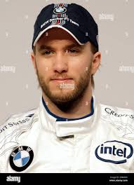 Formula 1 driver Nick Heidfeld from Germany poses for photographers during  the car launch of the new BMW Sauber F1.08 in Munich, southern Germany,