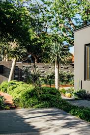 A Modest 1960s Bungalow Transformed To A Contemporary Home For A Family Of Five In 2020 Butterfly House Garden Design Bungalow