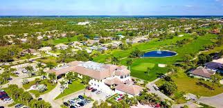 Tropical palms, mature oak trees and diverse water features define the landscape of a course that embodies the natural beauty of bonita springs, florida. Spanish Wells Golf Country Club Bonita Springs Florida