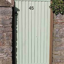 To find the best gray exterior paint for your home, consider the surrounding landscape and nearby architecture. Parlyte Green Wood Paint Thorndown Wood Glass Paints