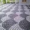 One of the best ways to design a cheap patio floor is to find flooring that you can install yourself, l ike these interlocking tiles from walmart. 3