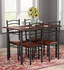 Check spelling or type a new query. Buy Ivy 4 Seater Dining Table In Dark Walnut Finish By Forzza Online Modern 4 Seater Dining Sets Dining Furniture Pepperfry Product