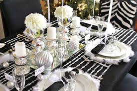 Depending on the size of your party, think about the type of furniture you want to have available for your guests, dining tables, bar tables, seats and stools are all great options. Black White Silver Holiday Table White Christmas Decor Christmas Table Decorations Christmas Table Centerpieces