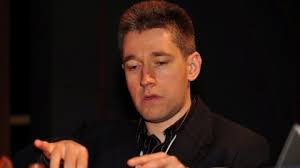 Michael Adams Claims The 1st Metropolitan International