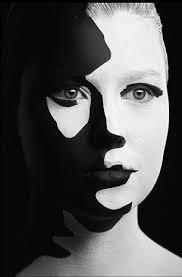 Black And White Face Paint Ideas Mickey Mouse Chanel And A Recycling Sign Bizarre Shapes Created On Model S Face Using Only Black And White Paint Black White Face White Face Paint Black White Makeup