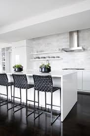 So whether you like a modern look or a traditional tone, cream will go perfectly with it. Black Leather Weave Counter Stools At White Kitchen Transitional Kitchen