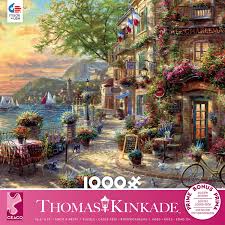 With a size of about 0.8 x 0.7, the pieces of the 500 piece puzzle are just as large as the ones of the 1000 piece photo puzzle. 1000 Piece Puzzle Featuring French Riviera Cafe Puzzle From Ceaco Thomas Kinkade Studios