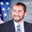 What is the difference between a Program Manager and Engineering Manager?