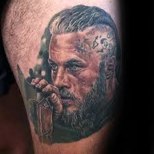 While fans wait for part 2 of vikings season 6, it's a good moment to take a look back at those characters that helped shape the series and their. Thigh Tattoo With Ragnar Portrait Tattooimages Biz