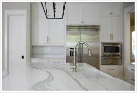 Brittanicca Quartz By Cambria Is Made Up Of A White Base With Black And Silver Vein Kitchen Remodel Countertops Quartz Countertops Cost White Quartz Countertop